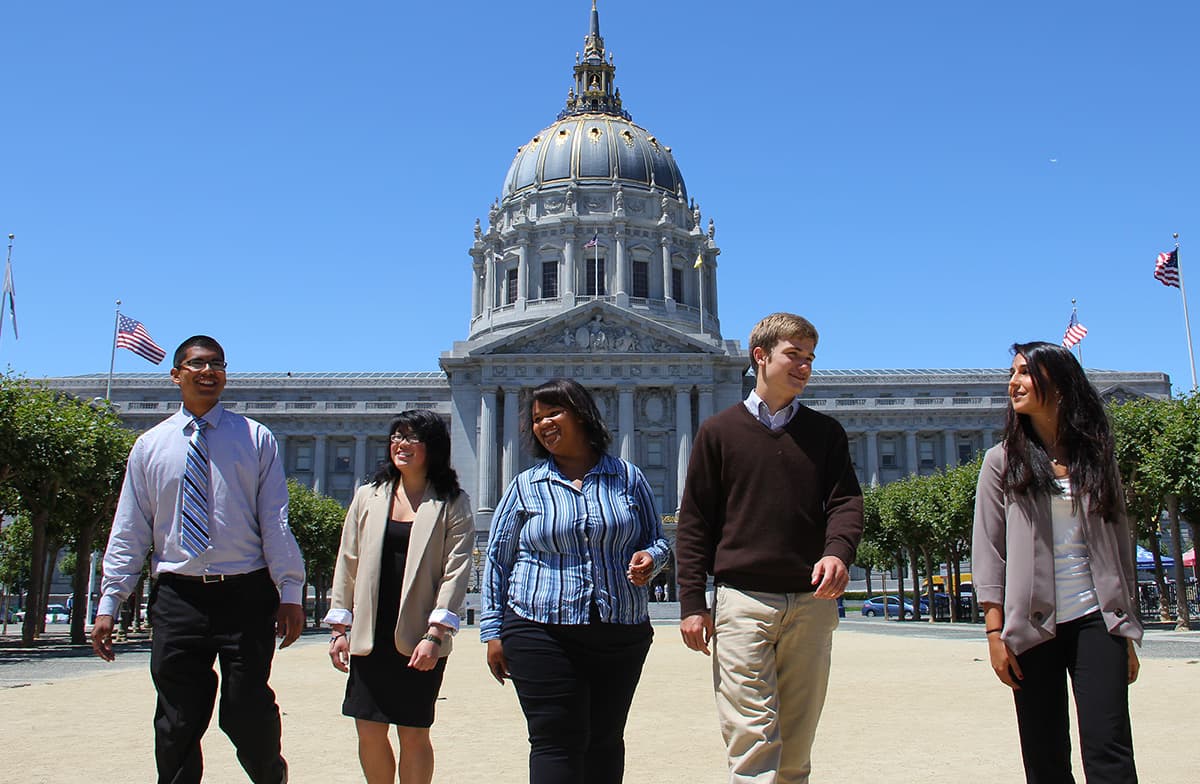Interns walking in front of San Francisco City Hall